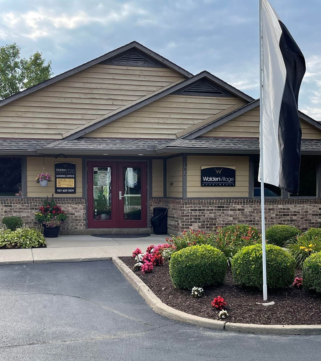 a building with a flag in front of it