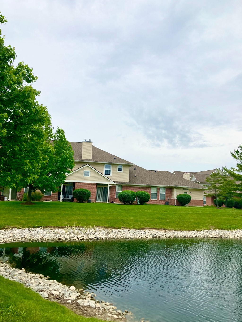 the view of our home from the pond