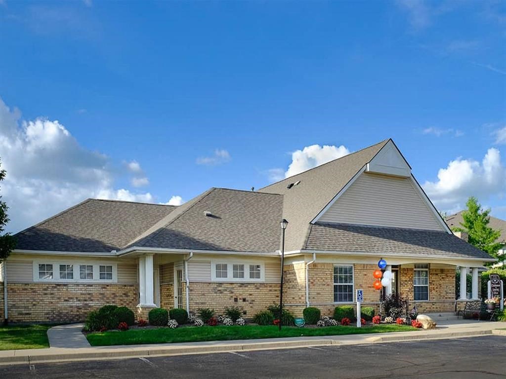 a house with a street sign in front of it
