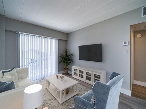 a living room with a couch and a table