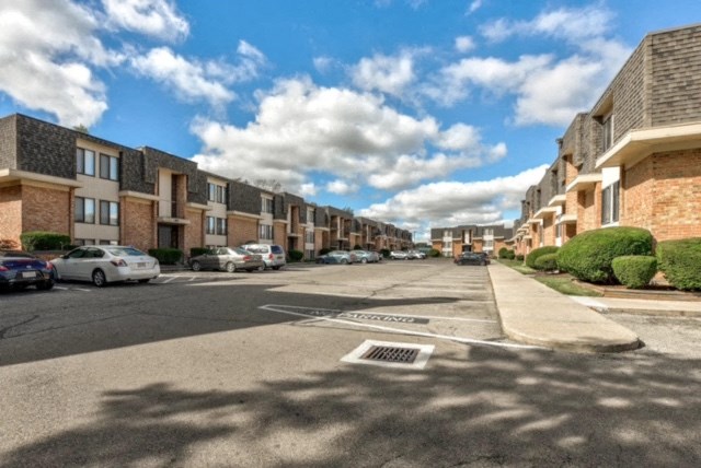 Wyoming Hills buildings with blue sky and parking