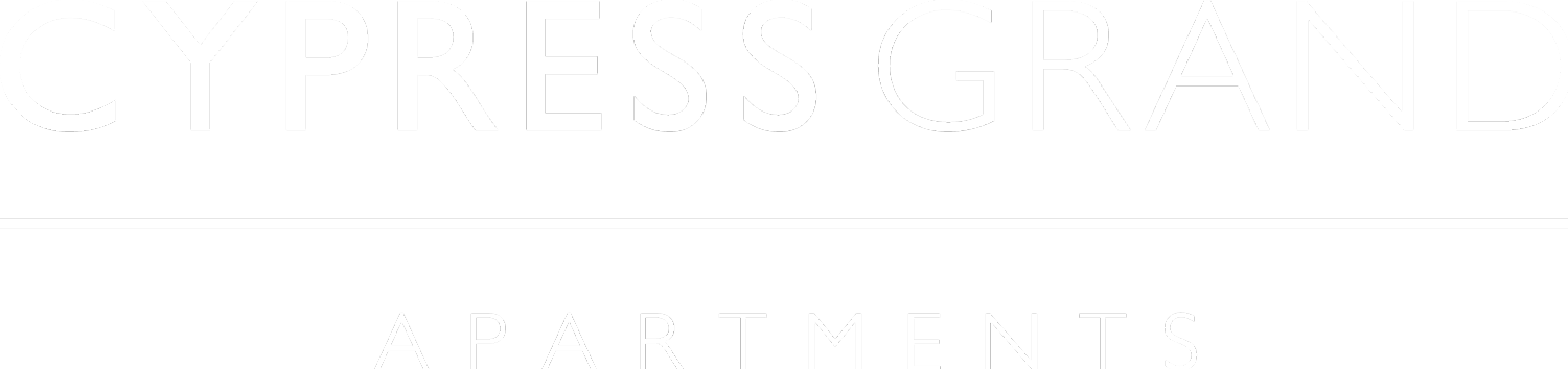 A sign that says Cypress Grand Apartments.