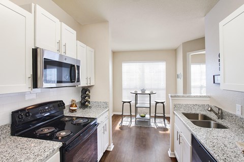 Kitchen renovations include granite countertops and stainless steel appliances (Signature Series)