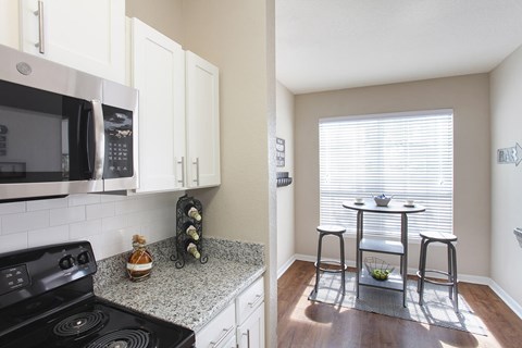 Kitchen renovations include granite countertops and stainless steel appliances (Signature Series)