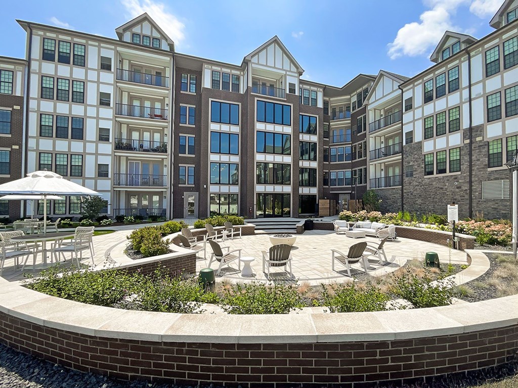 Courtyard with seating area and fire pit