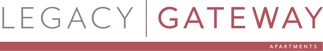 A sign that says Legacy Gateway in red and green.