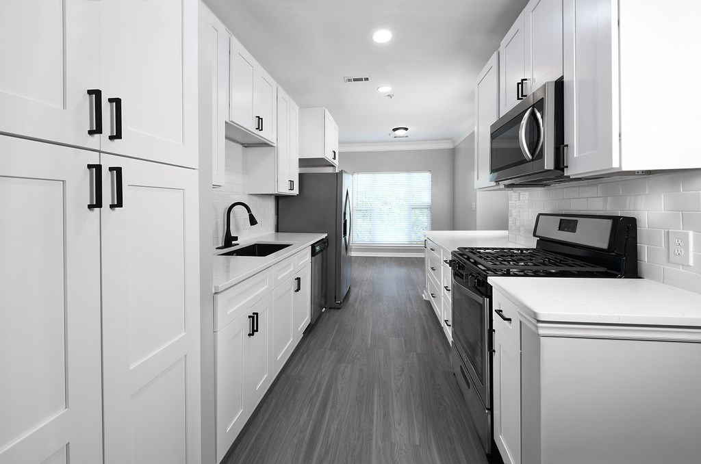 BRAND NEW SUITES - quartz countertops, stainless steel appliances, large pantries and matte black finishes and hardware