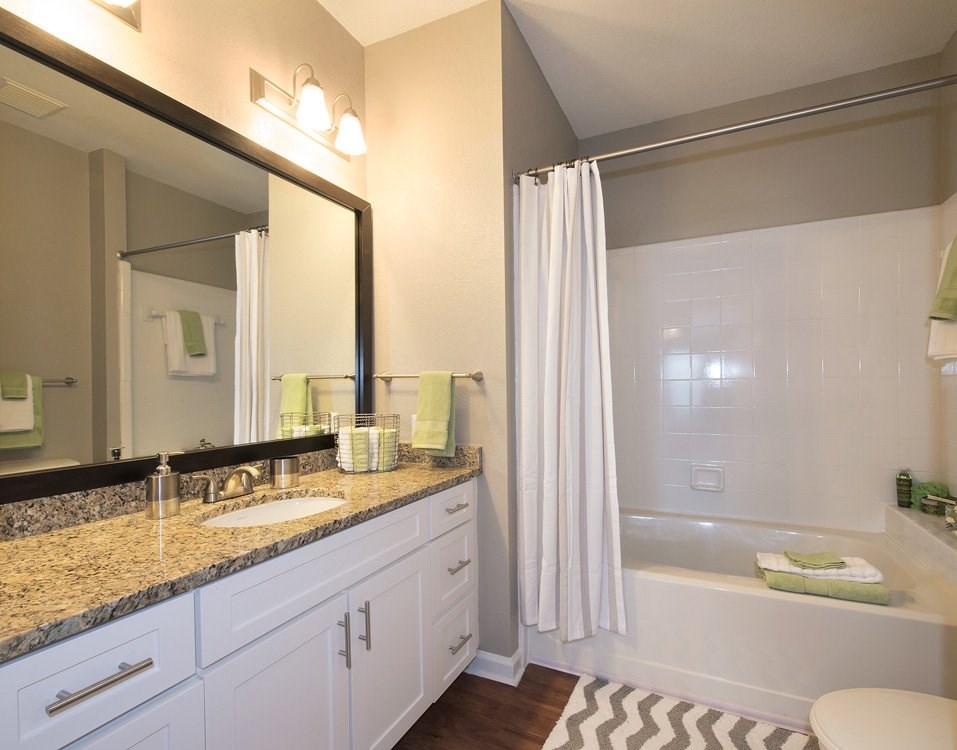 Framed mirrors in bathrooms