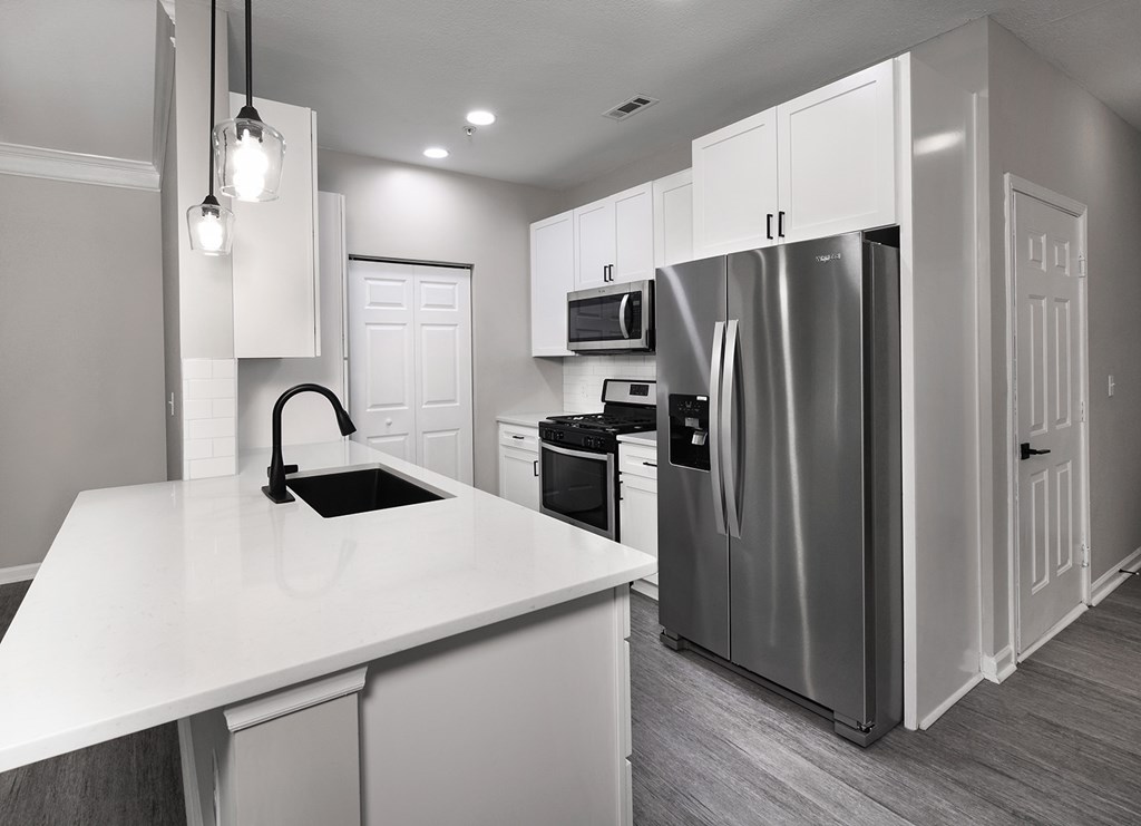 BRAND NEW SUITES - quartz countertops, stainless steel appliances, and matte black finishes and hardware