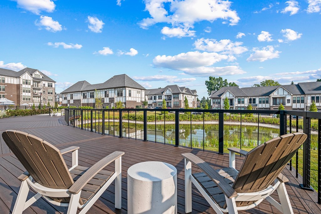 Deck and chairs overlooking the courtyard pond