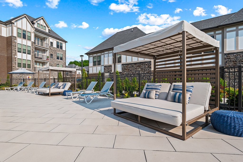 Pool cabanas and lounge chairs