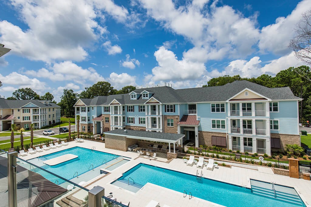 Bi-level saltwater pool with sundeck, cabanas and outdoor TV