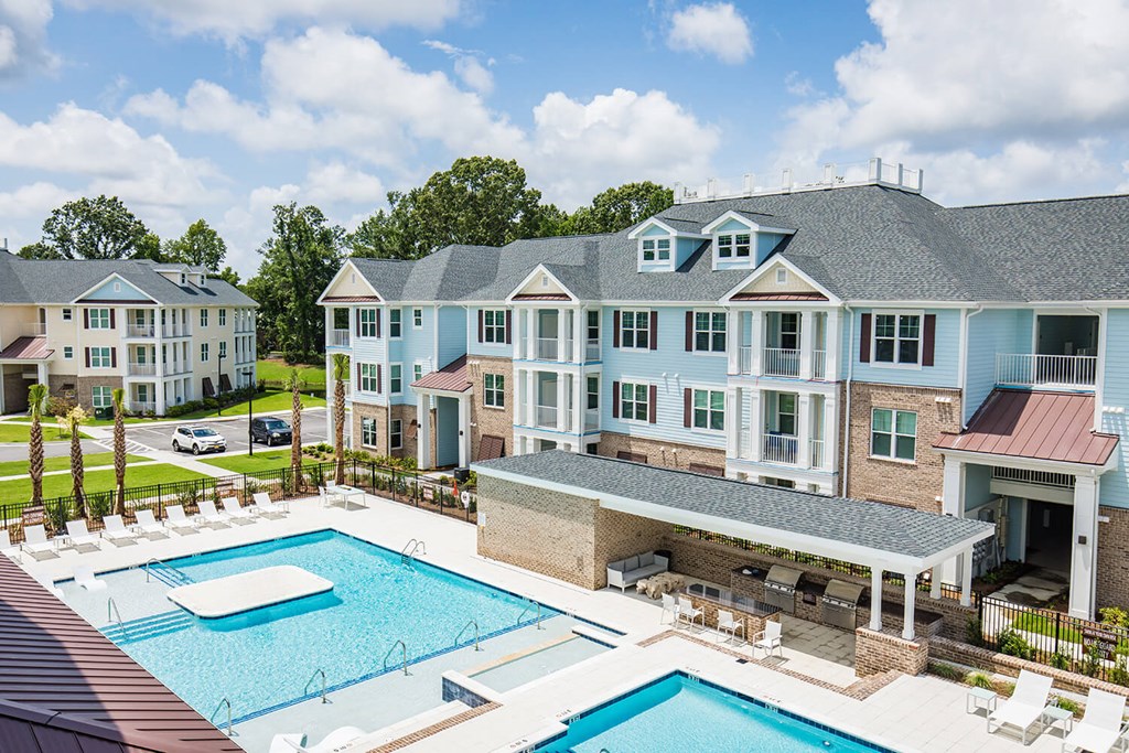 Bi-level saltwater pool with sundeck, cabanas and outdoor TV