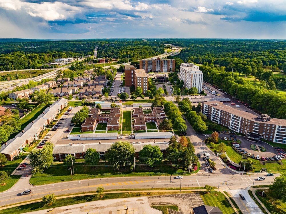 Large apartment complex with highrise, townhomes and garden suites