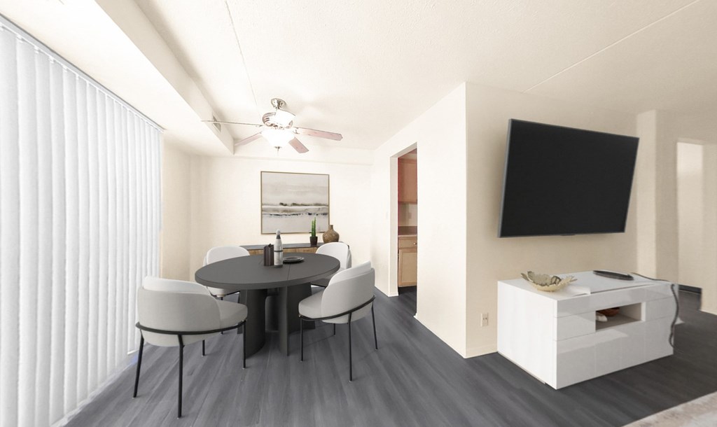 Dining rooms with overhead lighting and ceiling fan