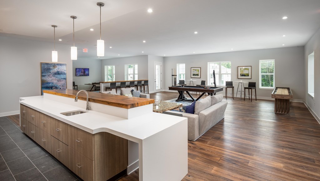 Multi-story clubhouse with lounge and kitchen