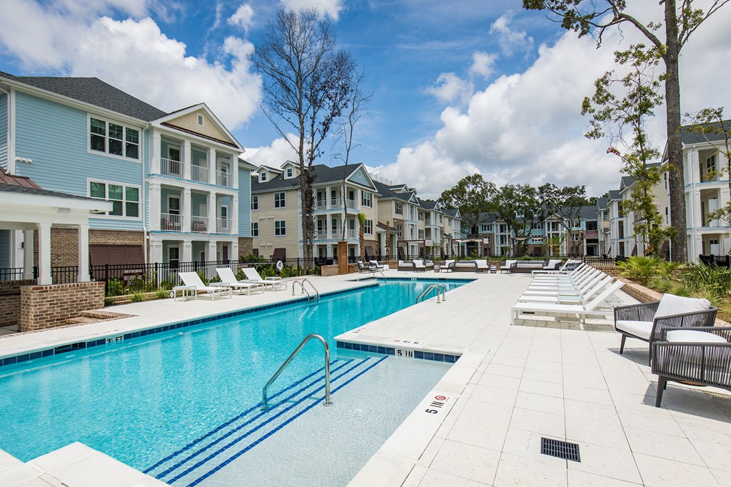 Bi-level saltwater pool with sundeck, cabanas and outdoor TV