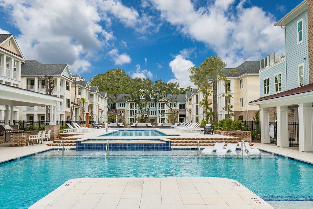 Bi-level saltwater pool with sundeck, cabanas and outdoor TV