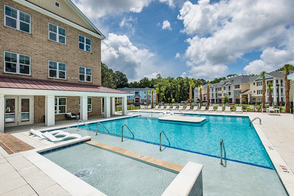 Bi-level saltwater pool with sundeck, cabanas and outdoor TV