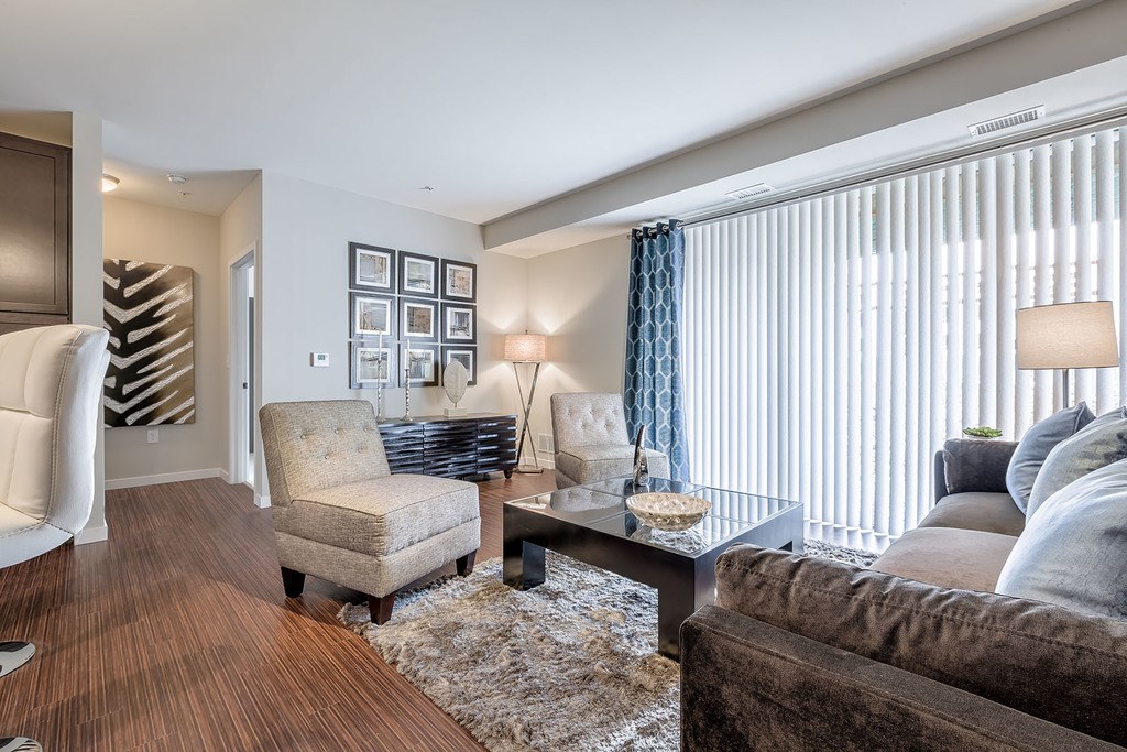 Living room with ceiling to floor windows