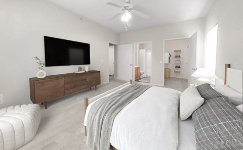 Large main bedroom with private bath, expansive closet, ceiling fan and overhead lighting