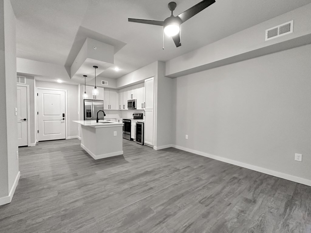 Hardwood-inspired flooring throughout