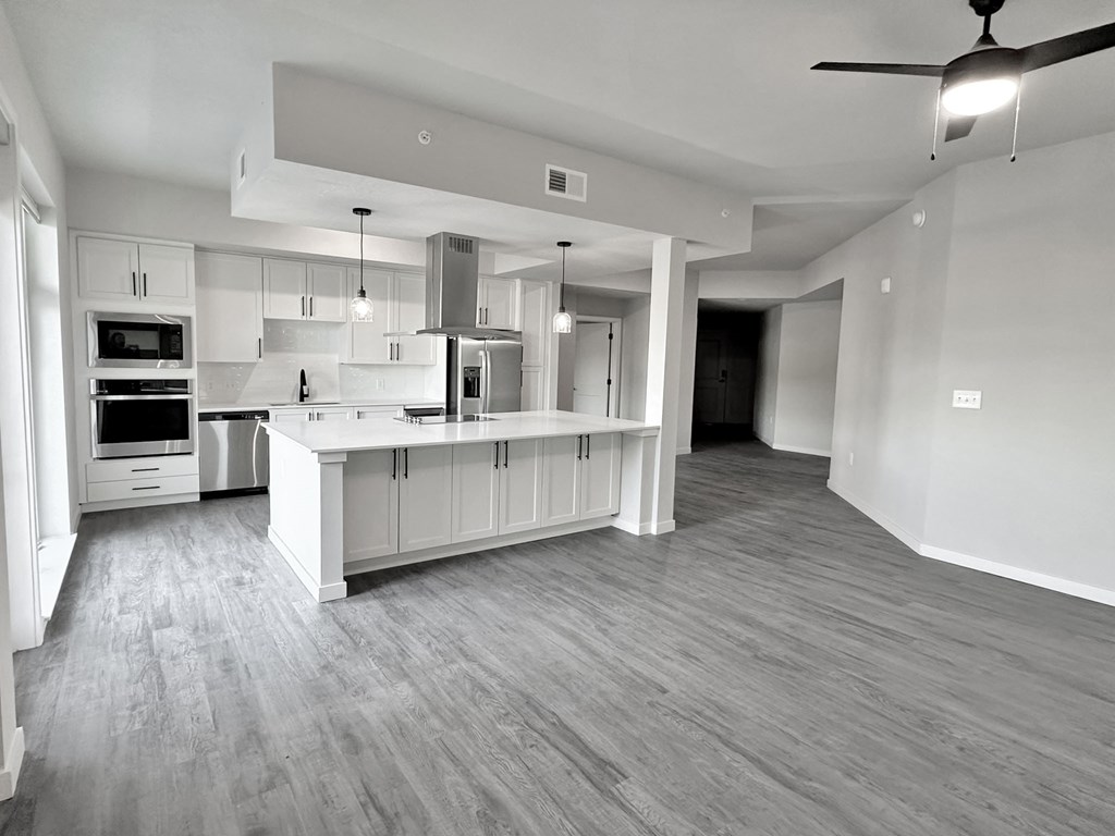 Wine coolers, large undermount kitchen sink and trendy tile backsplashes