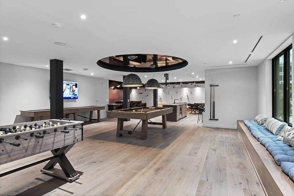 Foosball and pool table in gaming lounge