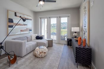 Hardwood-inspired flooring throughout