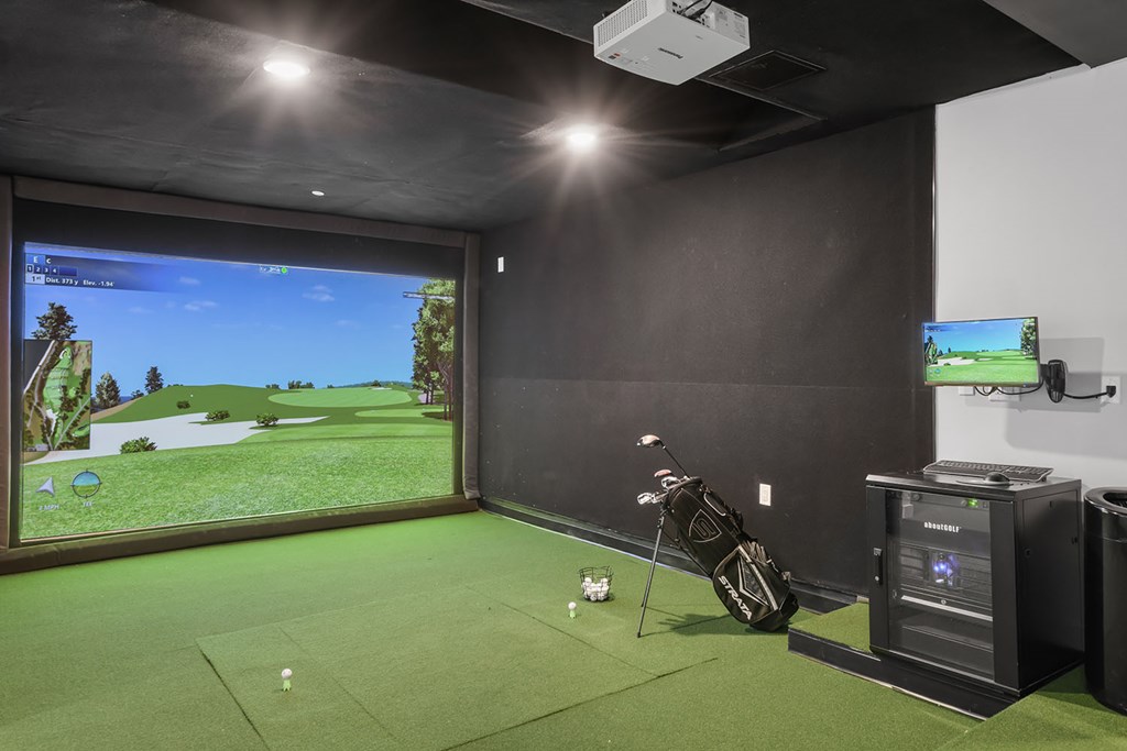 Virtual golf simulator in gaming lounge