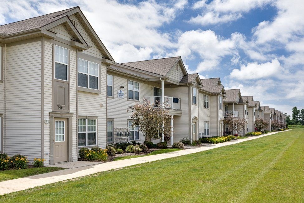 A row of houses with the word "Terrace" on the front of the first one.