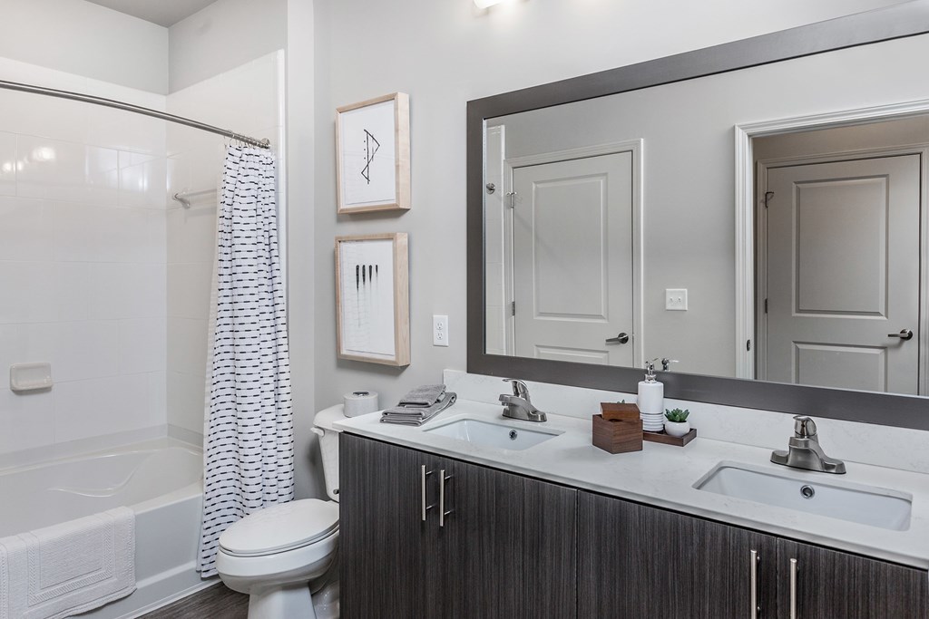 Bathrooms with dual vanities and garden soaking tubs