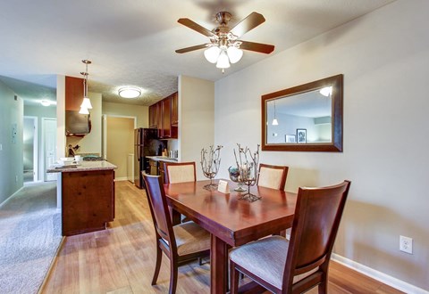 Dining area with hardwood-inspired flooring