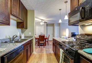 Fully-equipped eat-in kitchens with gas ranges, built-in microwaves and dishwashers