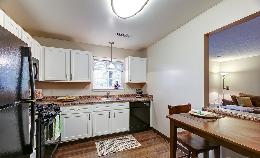 Newly renovated suites with sleek black appliances