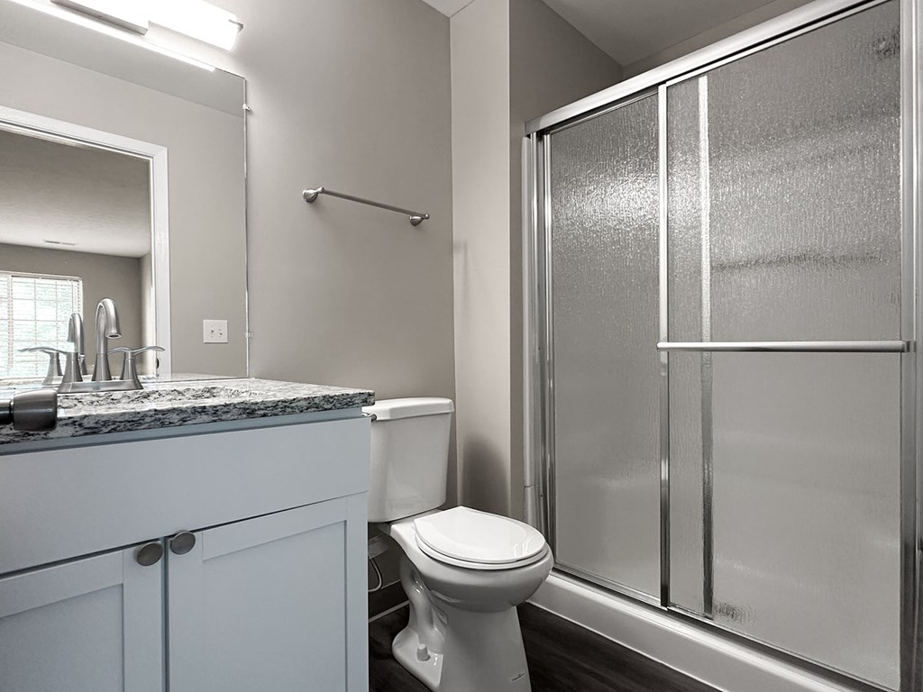 Tarrendon deluxe bathroom with granite countertops