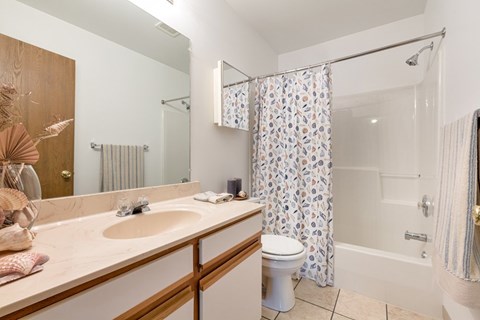 Bathroom with shower and bathtub