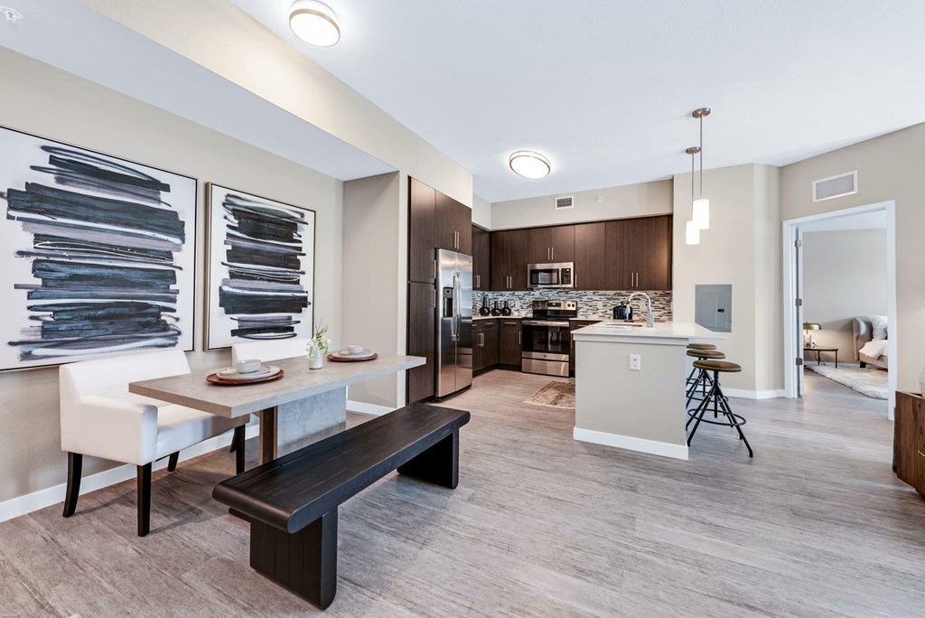 Hardwood-inspired flooring throughout entire apartment