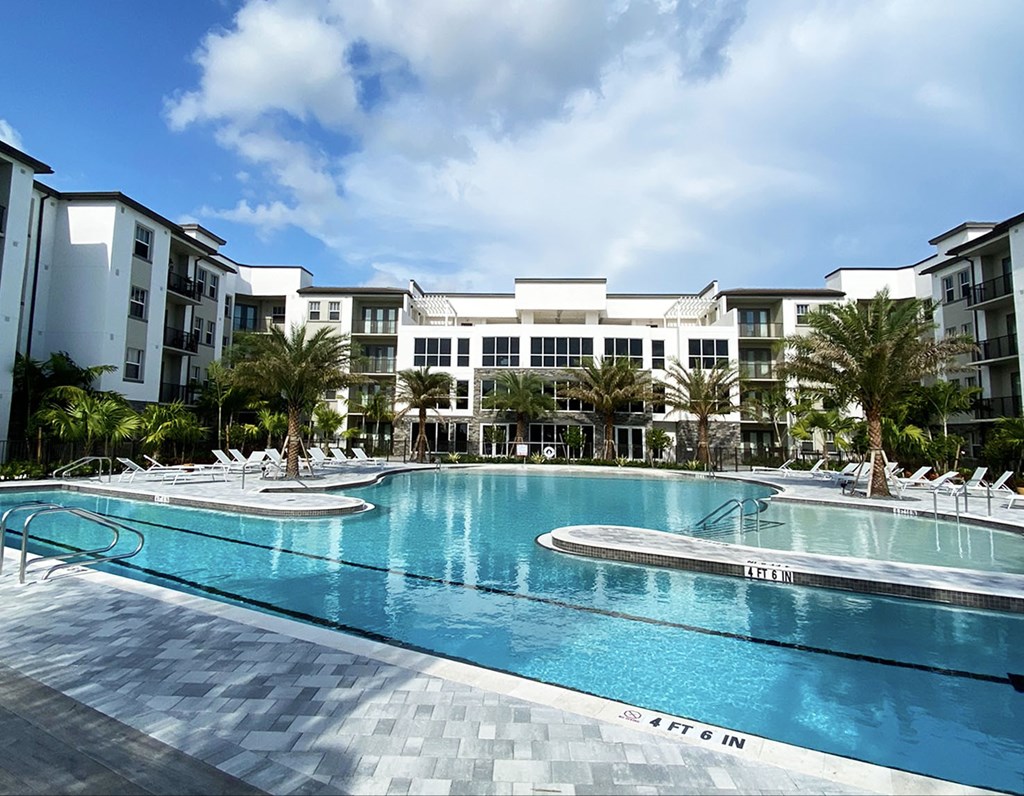 Heated saltwater pool with swim lane, cabanas, sun shelves and WiFi