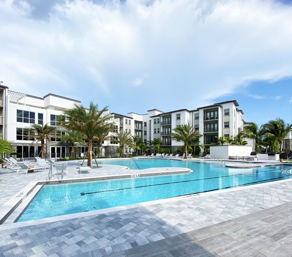 Heated saltwater pool with swim lane, cabanas, sun shelves and WiFi