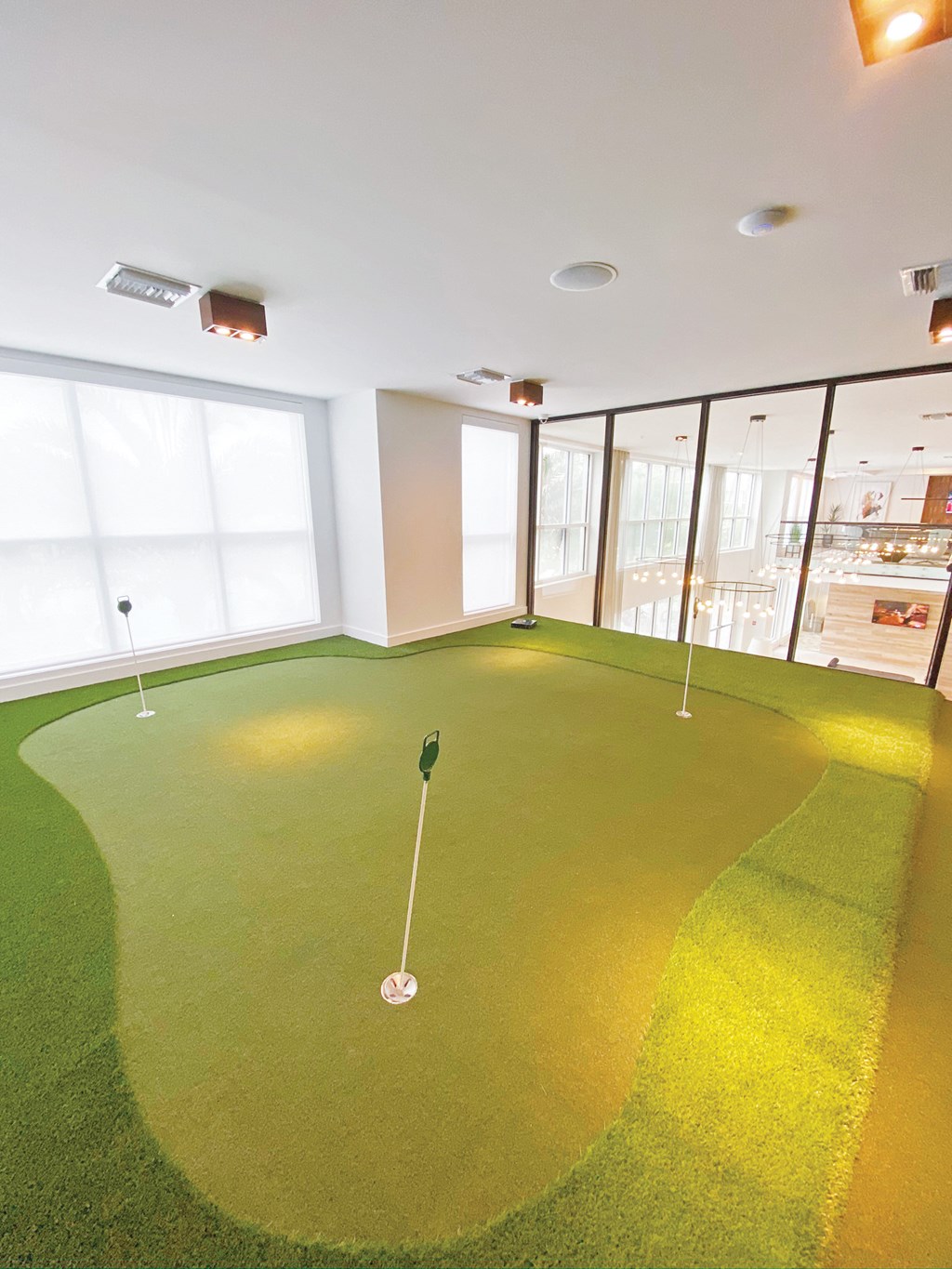 Virtual golf with putting green