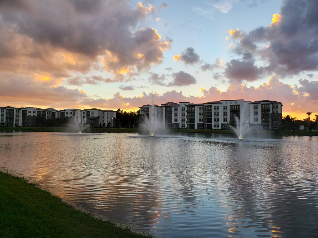 Private lake with fountains and walking path