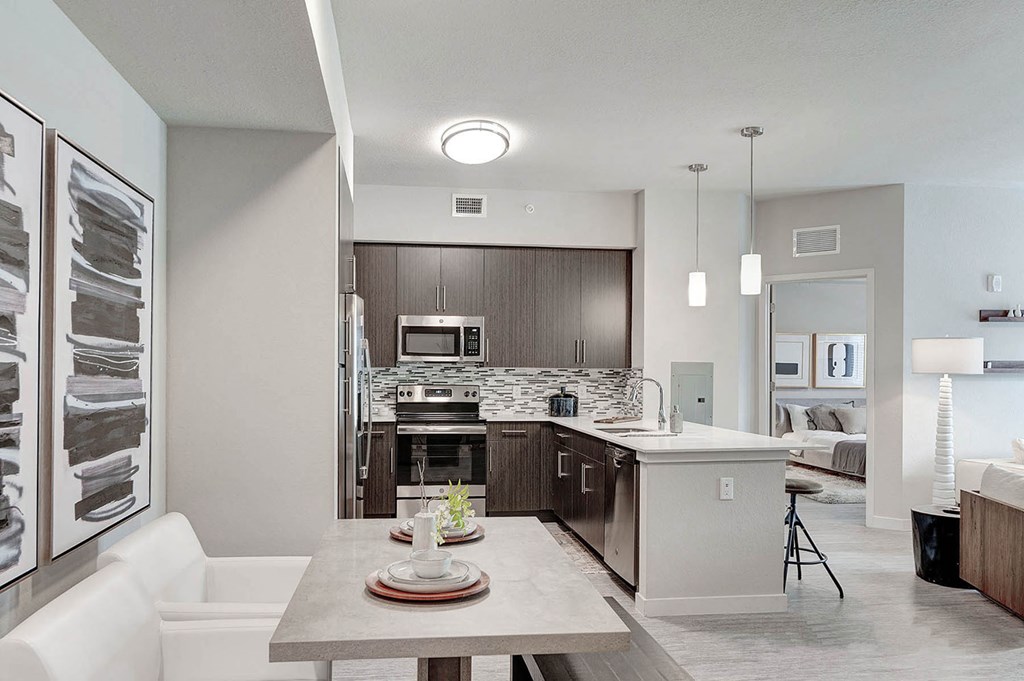 Beautiful dining area next to open concept upscale kitchen