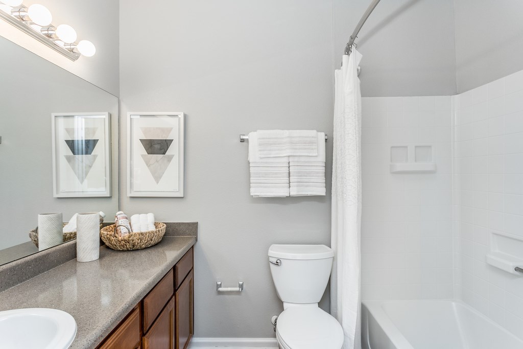 Tubs with curved shower rods