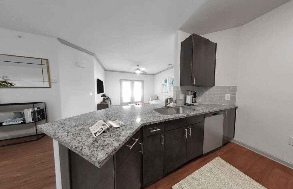 Townhomes feature fully-equipped kitchens with granite countertops