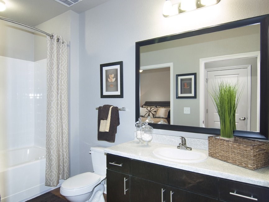 Bathrooms with curved shower rods