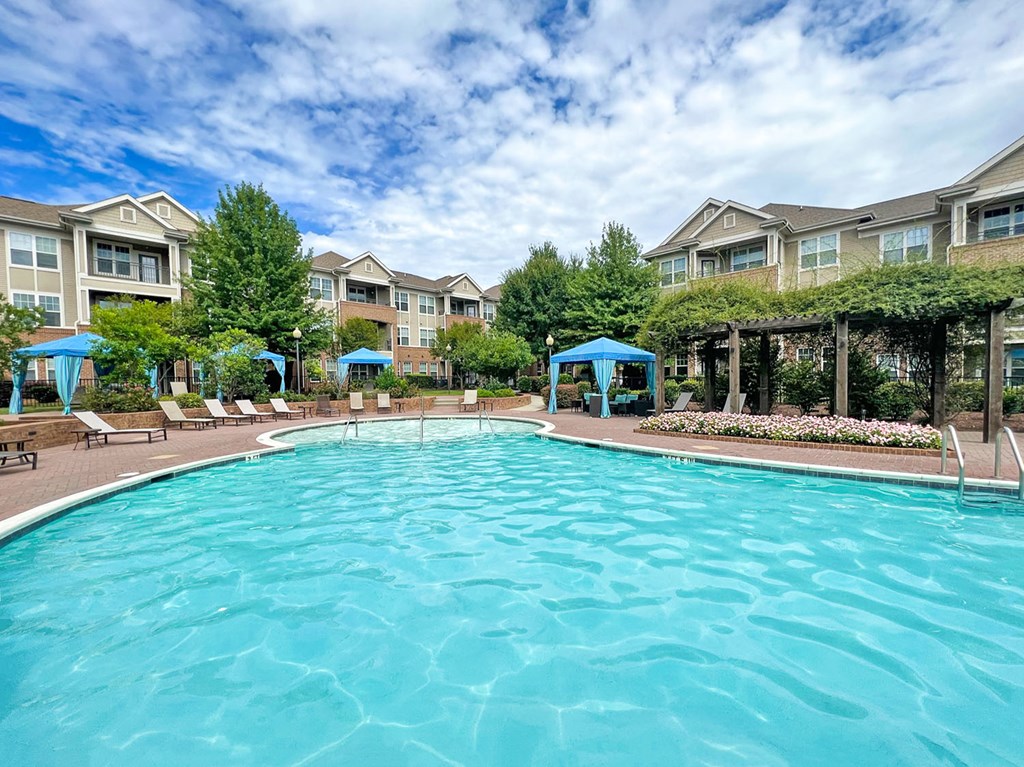 Saltwater pool with sundeck, fire pit, cabanas, WiFi, TV lounge and gas grills