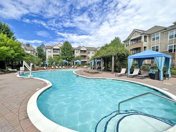 Saltwater pool with sundeck, fire pit, cabanas, WiFi, TV lounge and gas grills