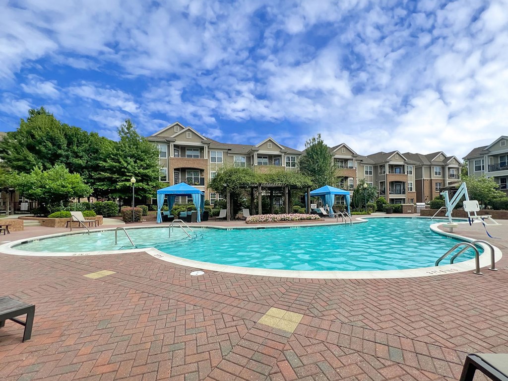 Saltwater pool with sundeck, fire pit, cabanas, WiFi, TV lounge and gas grills