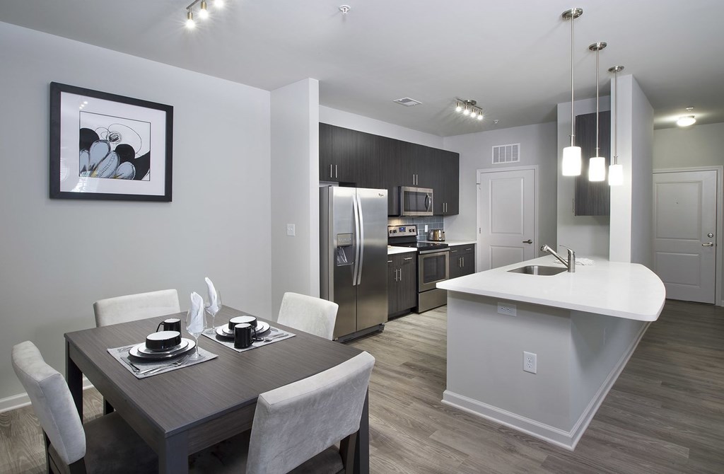 Phase II suites feature quartz countertops, stainless appliance package and contemporary gray finish 42" cabinetry